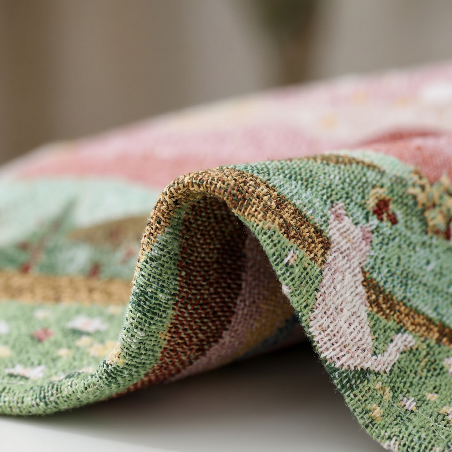 Macro at the fold showing the scene woven through to both sides, not printed