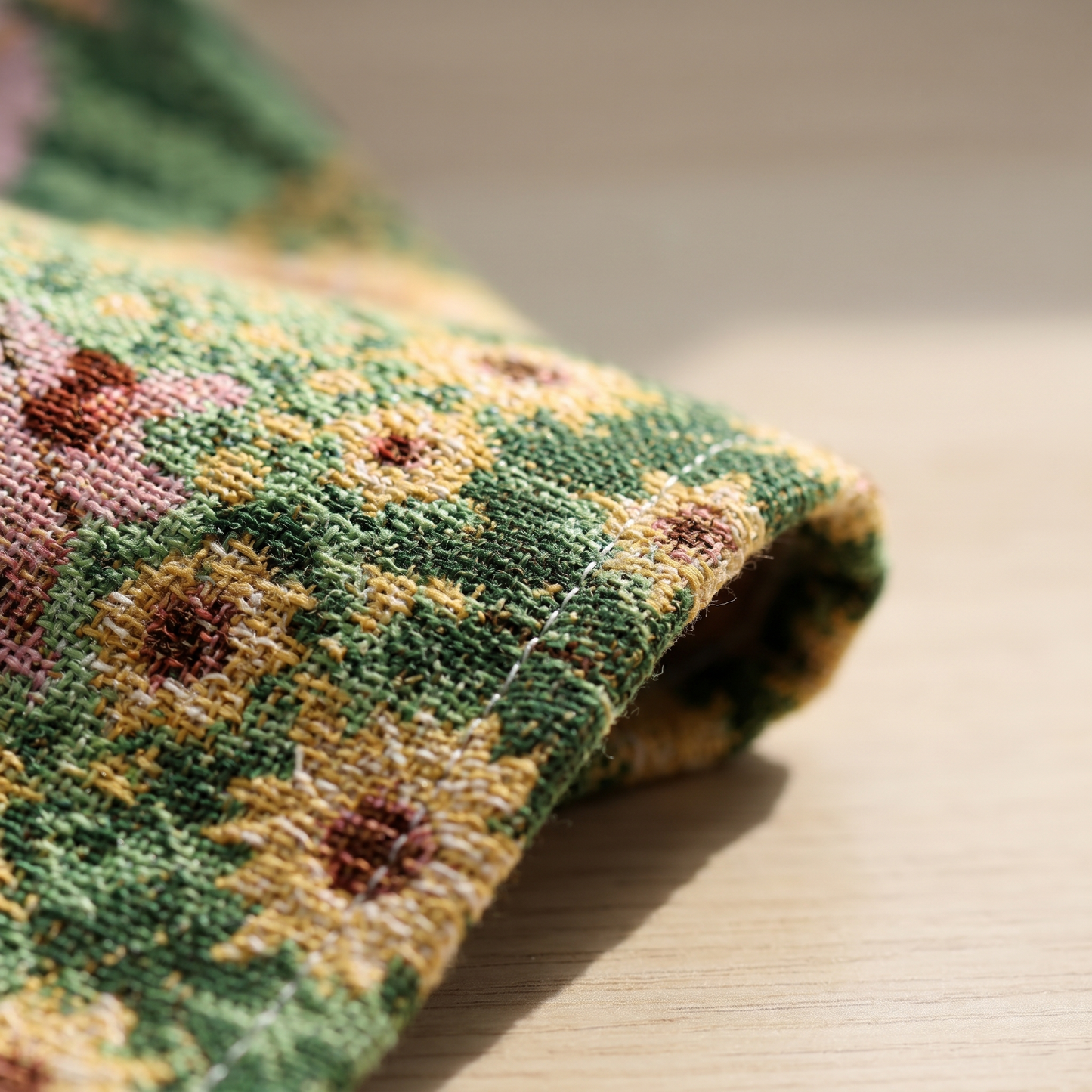 Macro of the dense cotton weave and the neatly hand-finished hemmed edge
