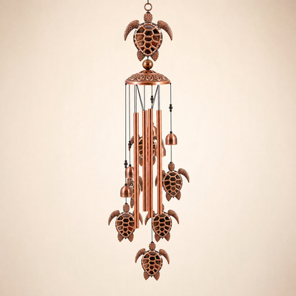 Nells Turtle Wind Chime — antique bronze sea turtle wind chime with hand-cut tubes and hatchling pendants, hero shot