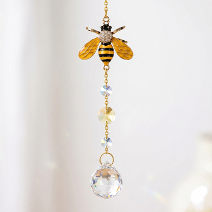 Single bee crystal light-catcher with faceted crystal ball on brass chain
