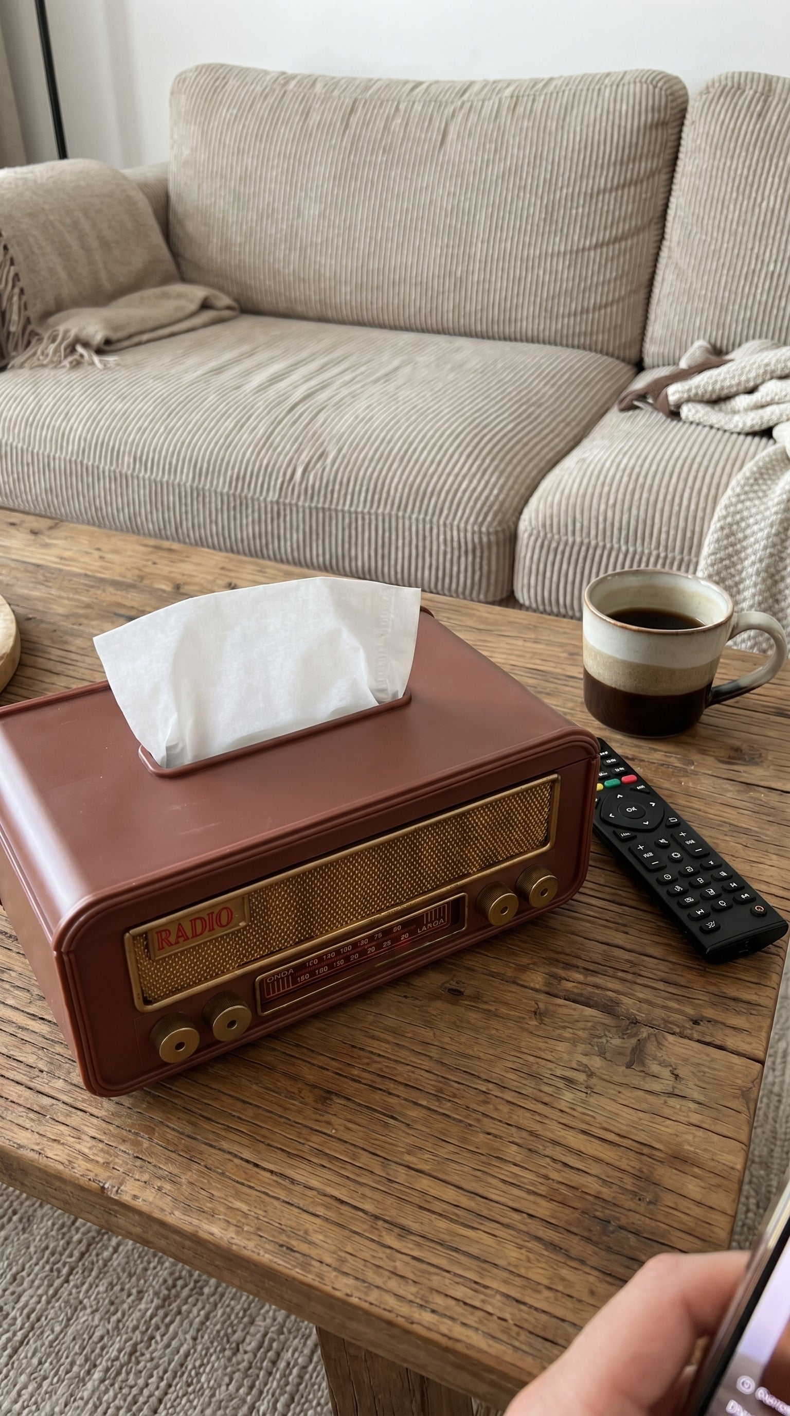 Radio tissue box on a living-room coffee table