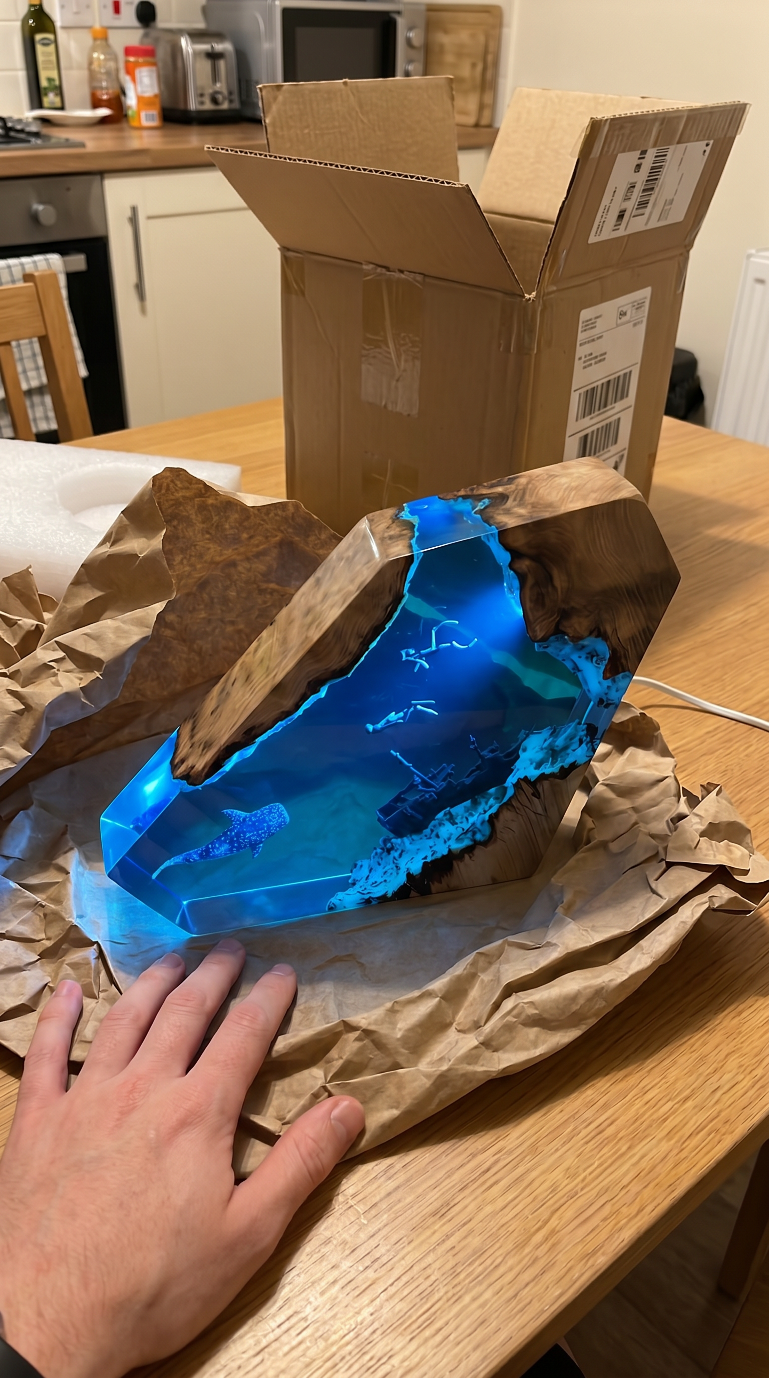 Tideglass lamp just unboxed on a kitchen table - customer photo