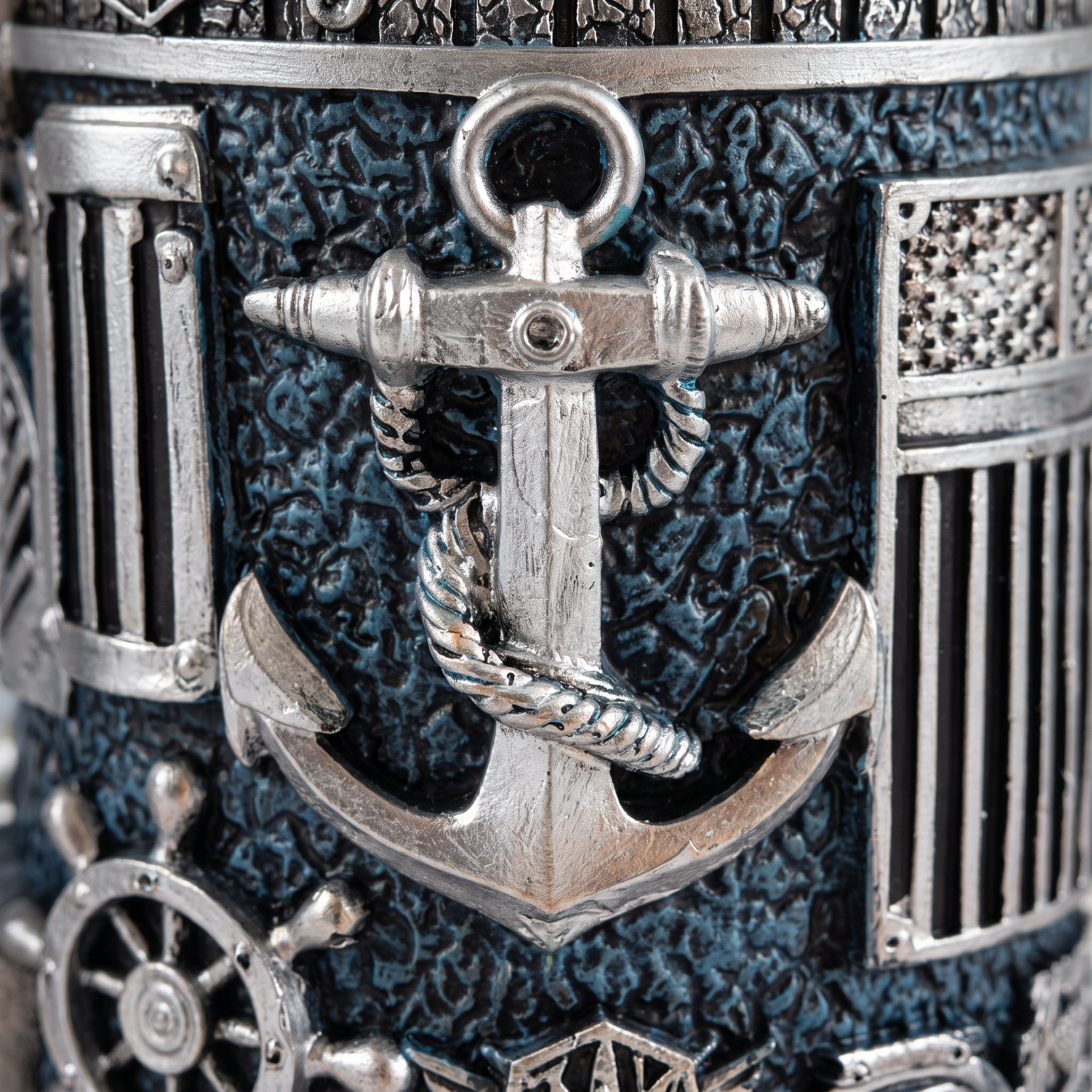 Close-up of the hand-cast anchor relief