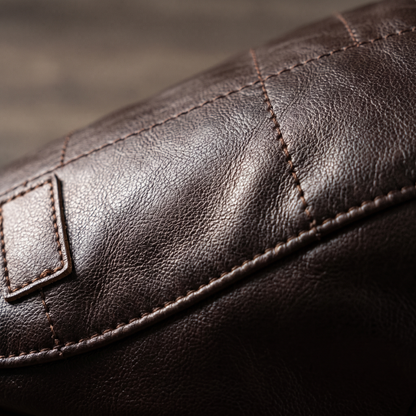 Macro detail of the leather grain and one quilt stitch line
